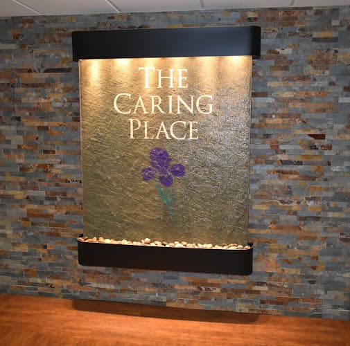 THE PURPLE IRIS AT THE CARING PLACE