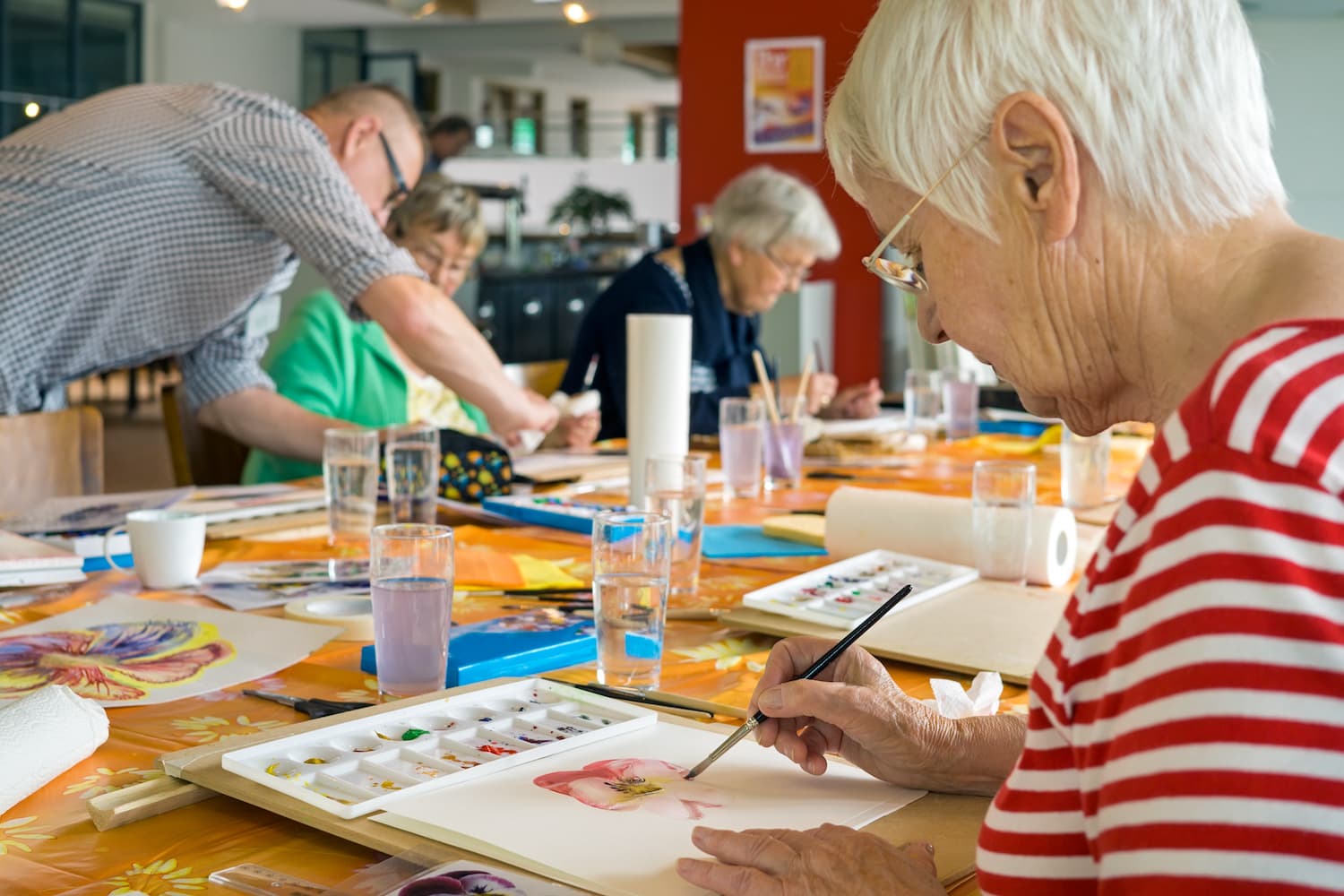 Seniors making water coloring paintings
