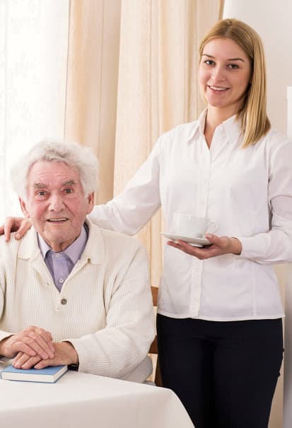old man with his caregiver